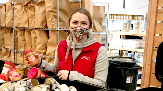 BECU employee working at a giving event